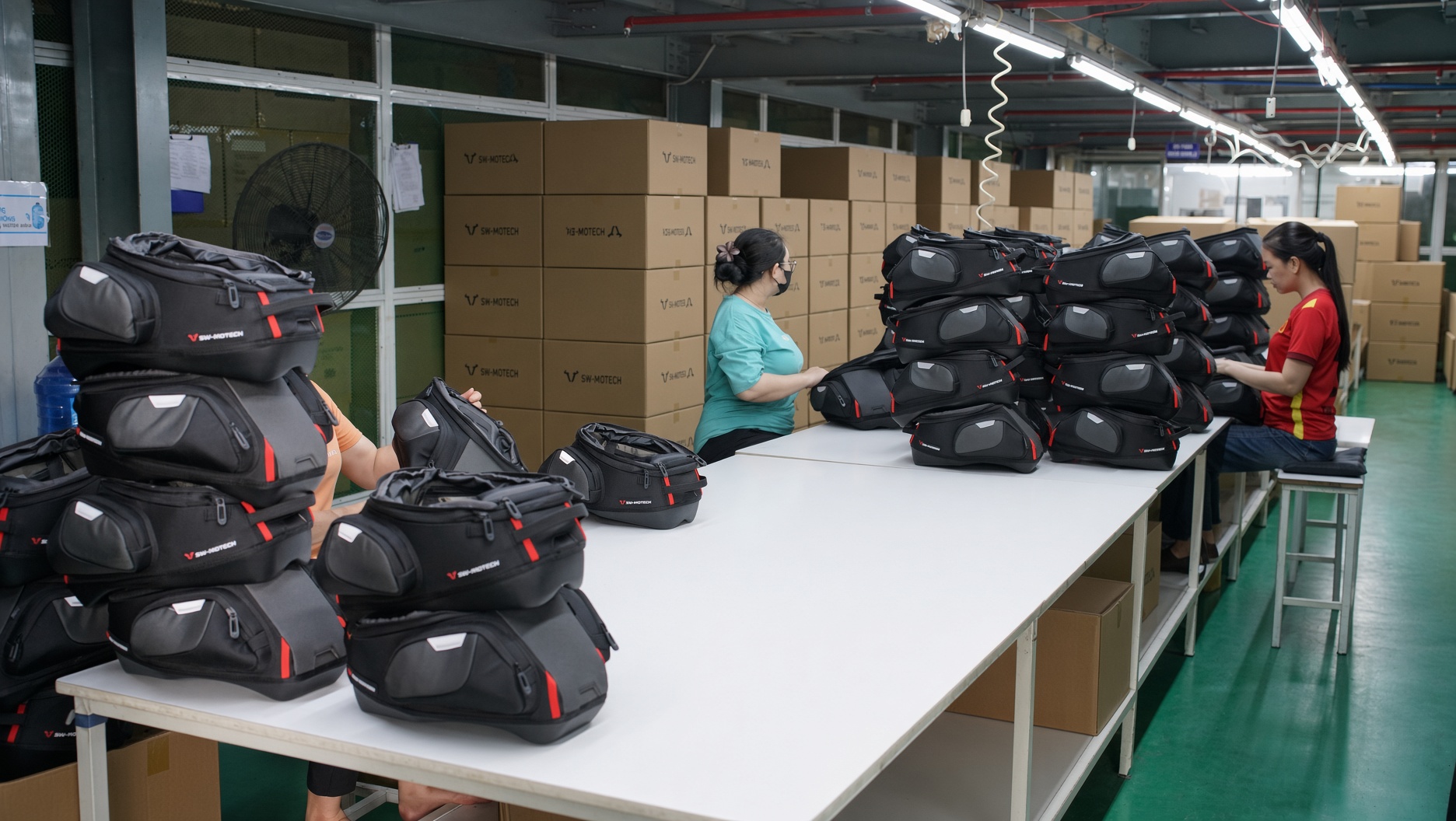 Finished bags at a factory worktable